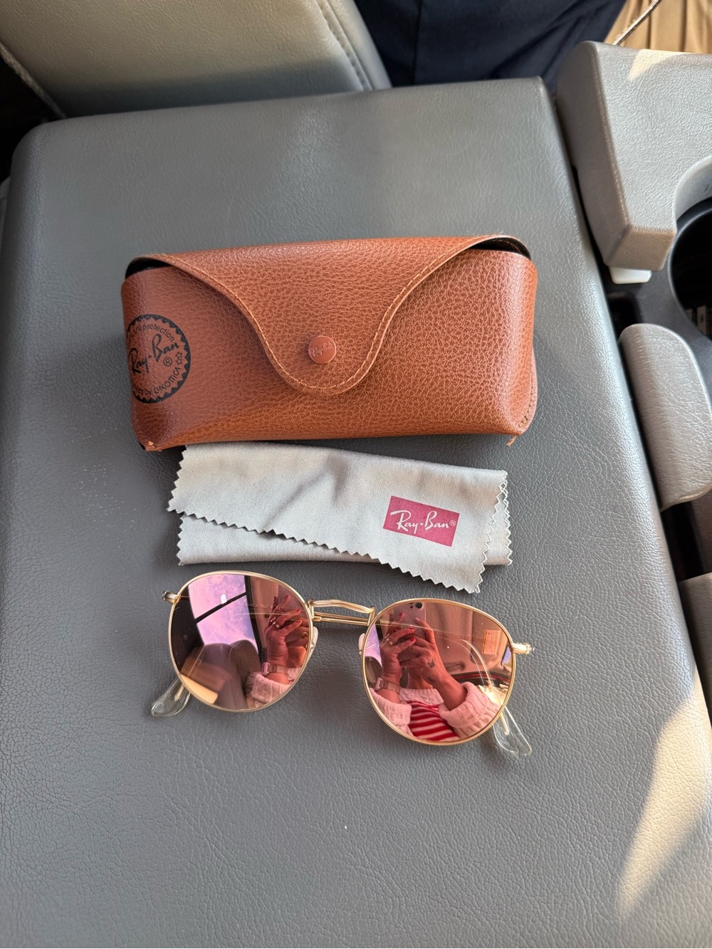 Ray-Ban Gold Frame Sunglasses with Pink Mirrored Lenses